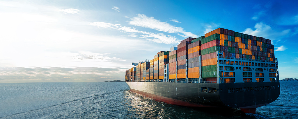 Container ship sailing on open sea